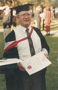 With my BA testamur on graduation day from Charles Sturt University